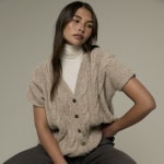 Rowan Oberteil Junia aus Wolle, gestrickt, in beige, mit Kabelmuster, für Anleitung geeignet.