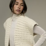 Rowan Wolljacke Tansy aus weicher, cremefarbener Wolle, perfekt für Strick- und Häkelprojekte.